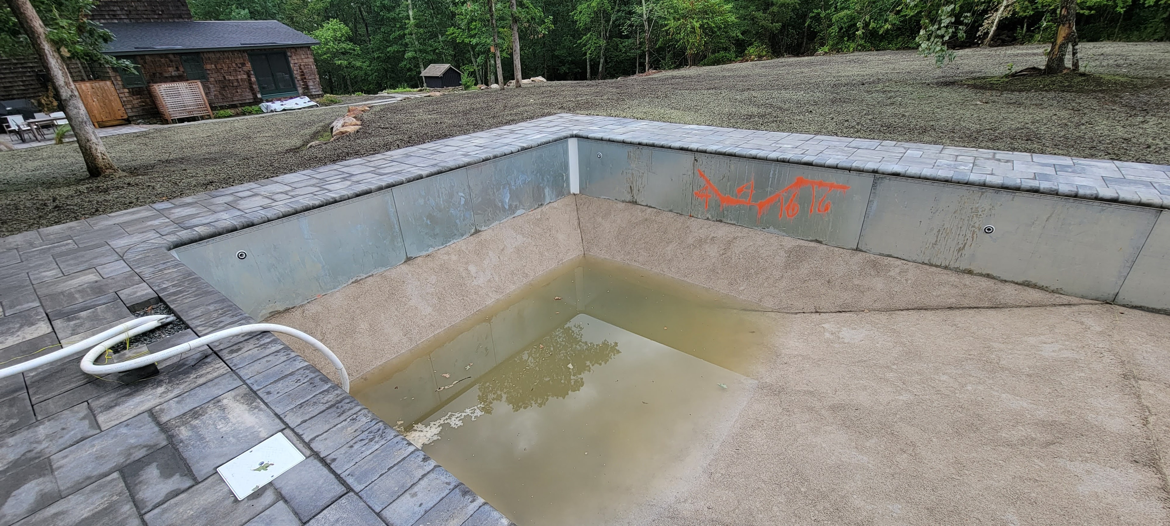 Pool kept filling up from the natural spring even after the vermiculite was installed.