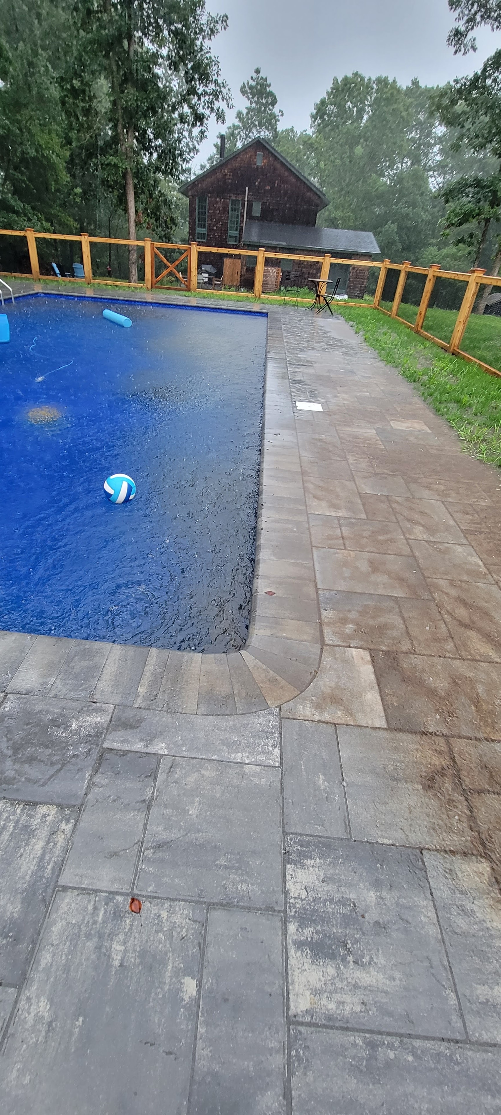 Drainage problems — Pavers pitched toward the pool. Every rain storm resulted in runoff into the pool