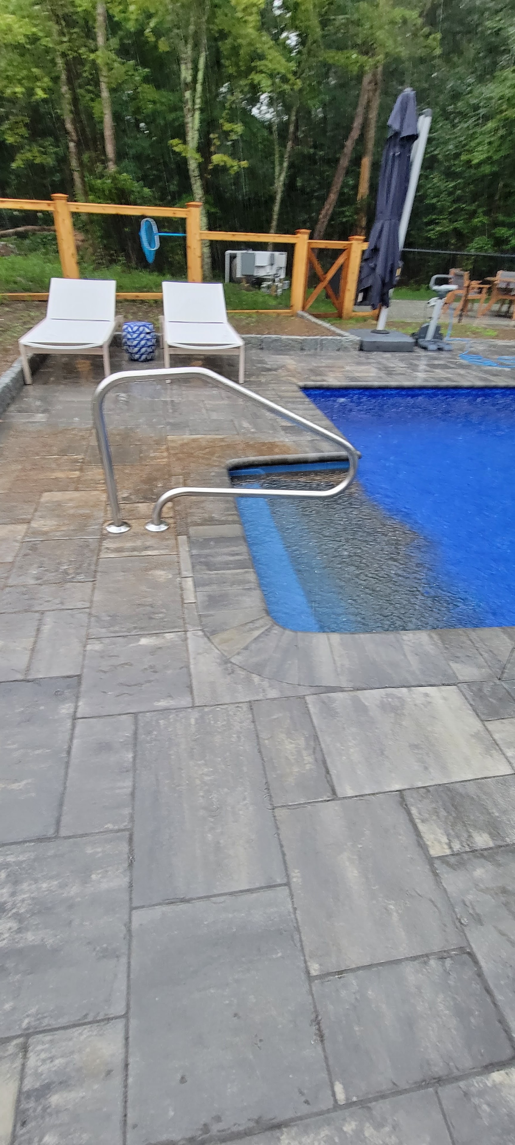 Runoff coming into the pool from multiple sides as there was no dainage system installed and paver delivered water into the pool