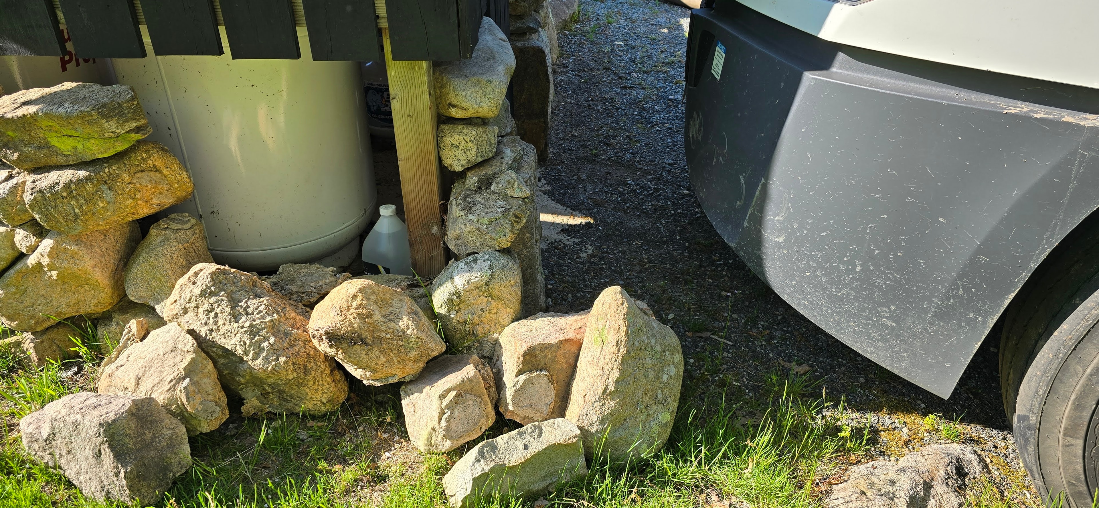 A tanker truck collided with an out building containing propane tanks